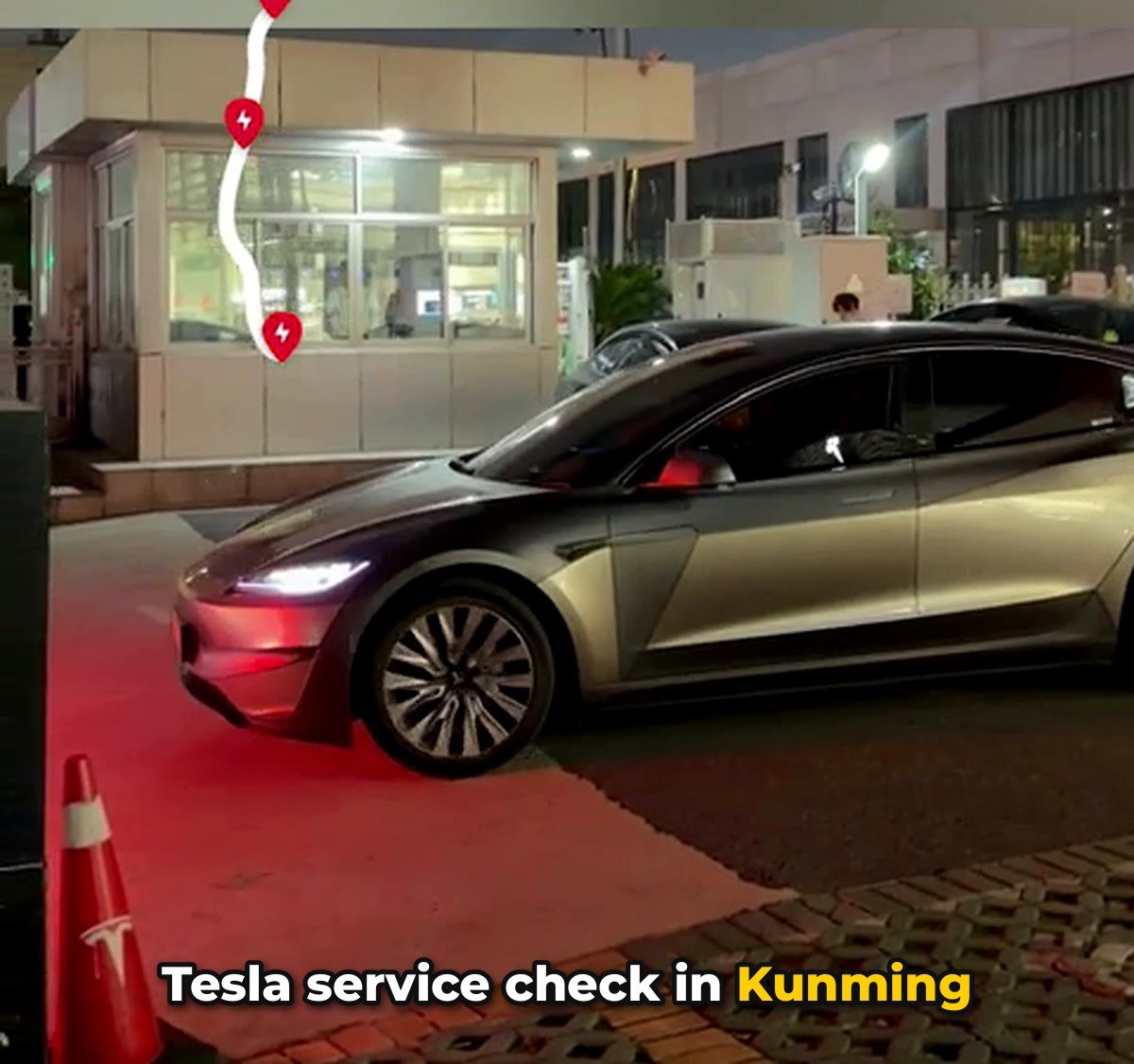 Tesla Model 3 arriving at a Tesla service centre in Kunming for a check after rough roads in Laos